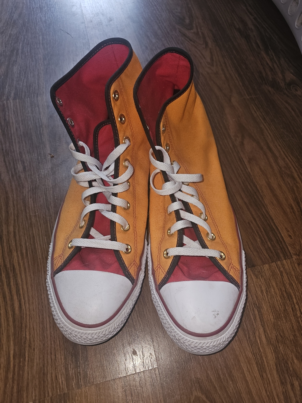 High-Top Canvas Chucks Allstar Sneakers — Custom Made Orange with Red Accents.